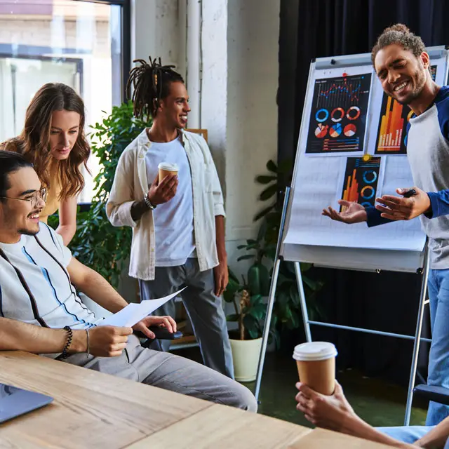 Digital marketing team reviewing business growth strategy